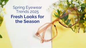 Pink translucent eyeglasses on a yellow background with spring flowers, representing soft blush eyewear trends for spring 2025.